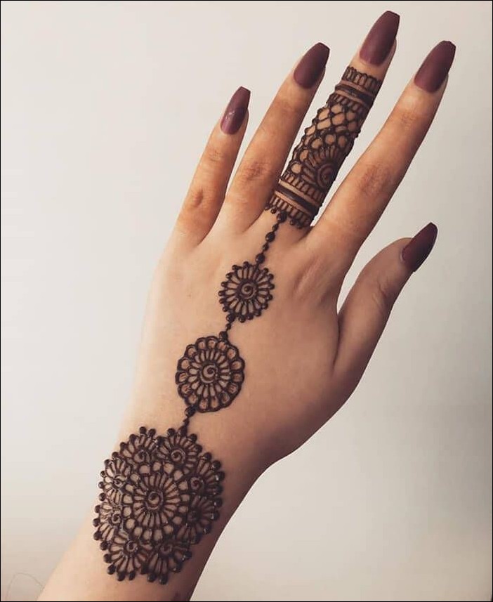 stylish back hand mehndi design 16